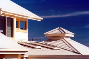 Rooftops and solar chimney, ecohome, Sunbury. Designed by Bridget Puszka BP Architects