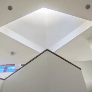 Sky window over stair. St Kilda West Home designed by Bridget Puszka, BP Architects