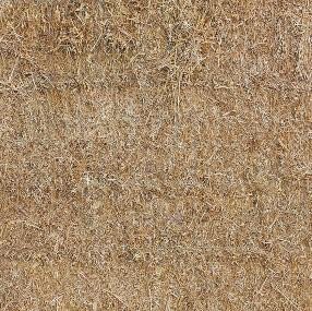 Compacted dense straw bales with little spaces between bales