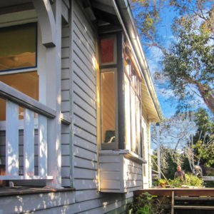 Passive solar design. Second hand bay window matching the character of the existing home